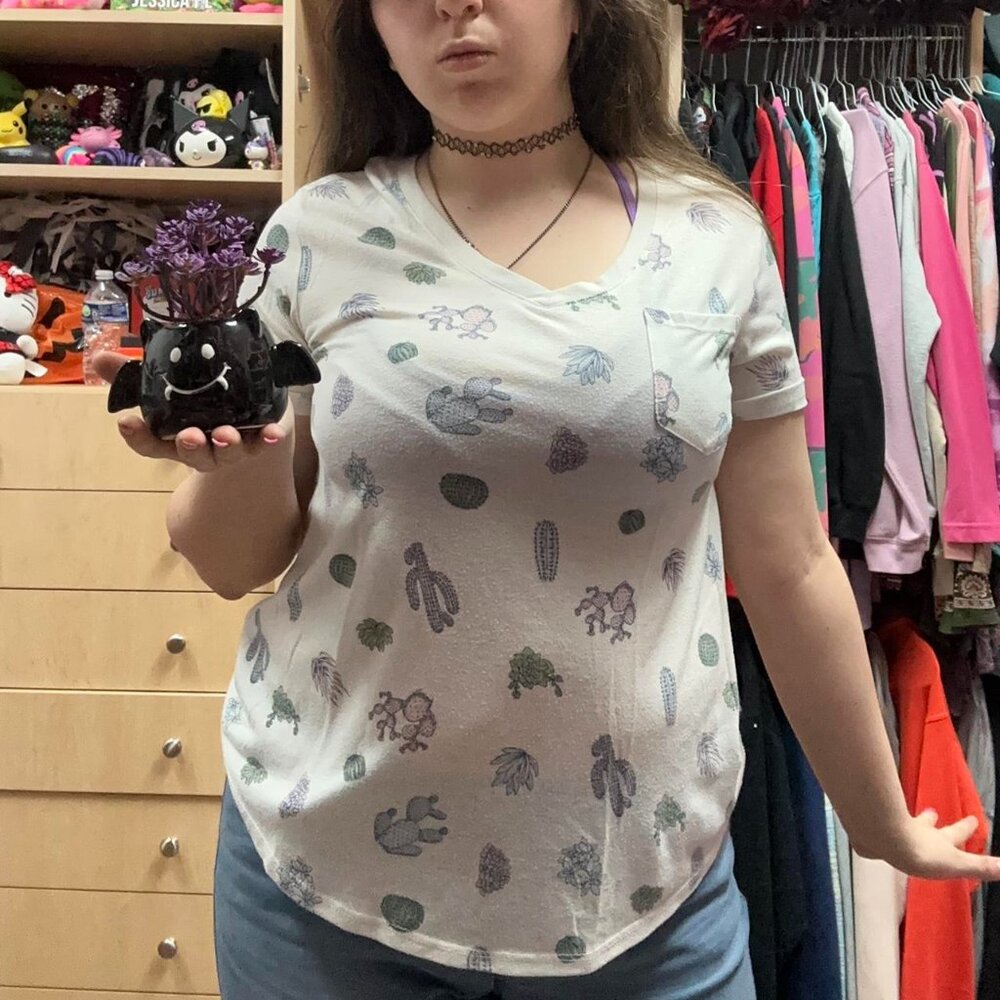 white shirt with cacti all over with a front pocket!!